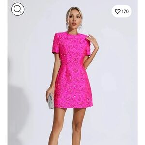 Bright pink jacquard floral mini dress.